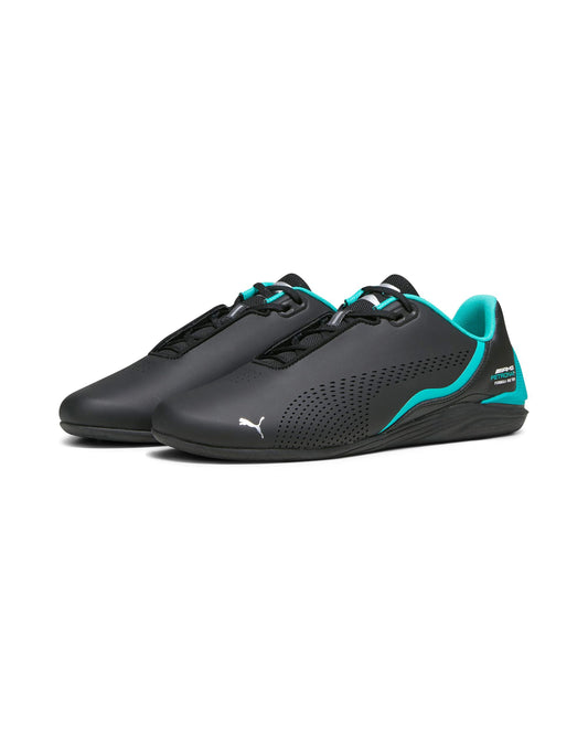 Black and teal sneakers with Puma logo on a white background
