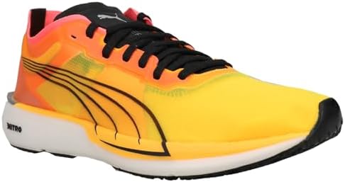 Yellow running shoe with black and orange accents on a white background