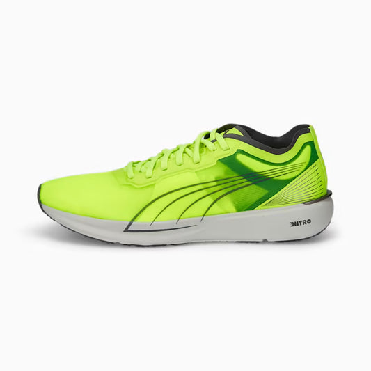 Bright green running shoe with black accents on a white background