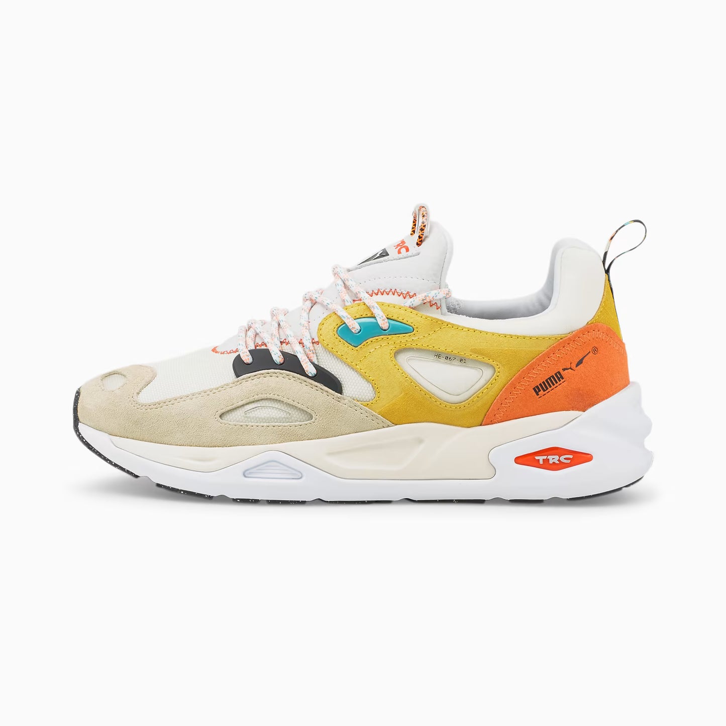 Multicolored sneaker with orange, yellow, and beige accents on a white background